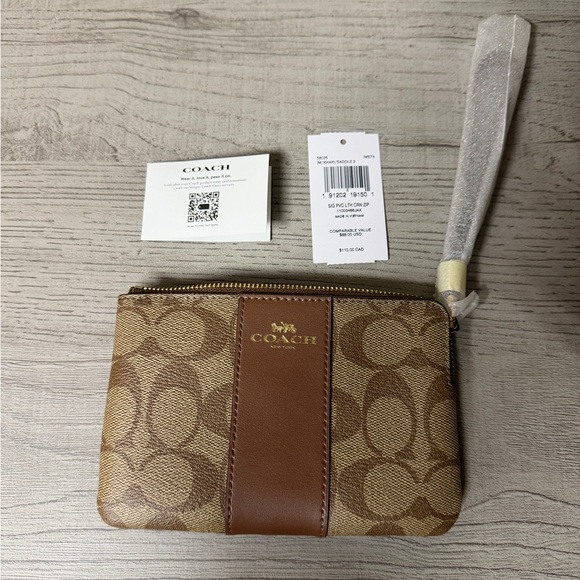 Coach Handbags - Coach Signature Brown and Tan Pouch